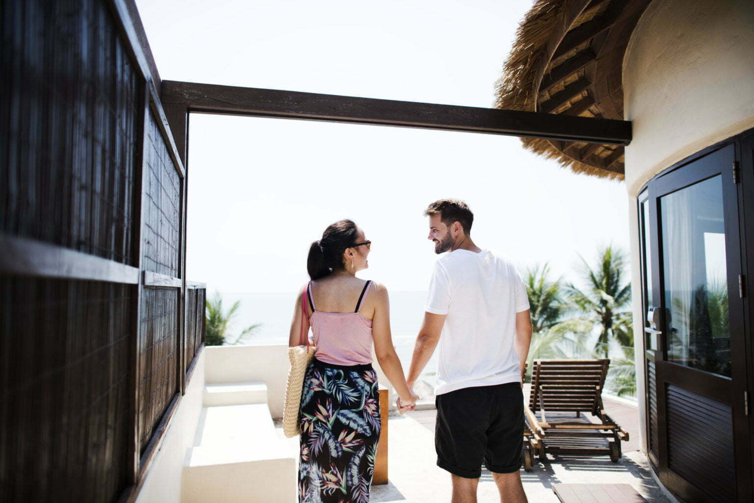 a man and woman looking at each other