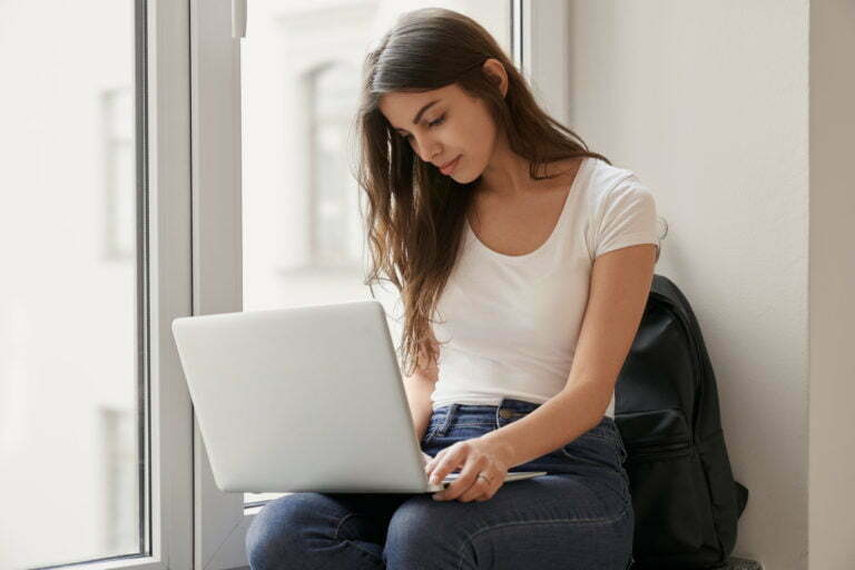 young women working on a laptop
