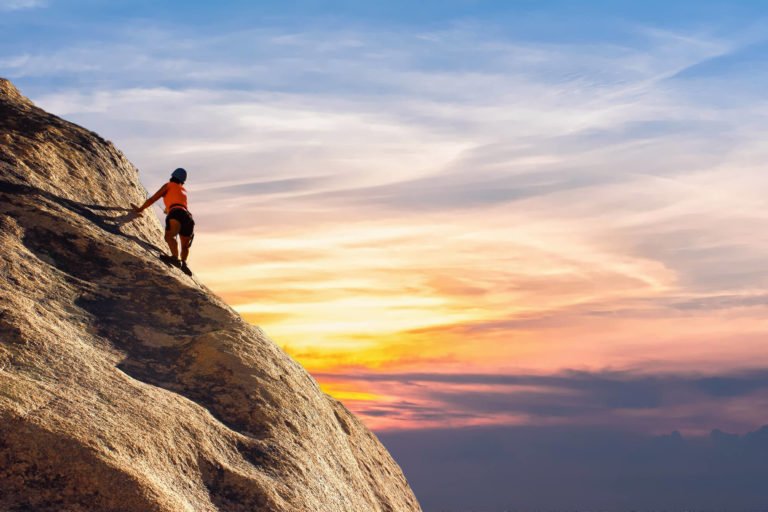 a person climbing a mountain